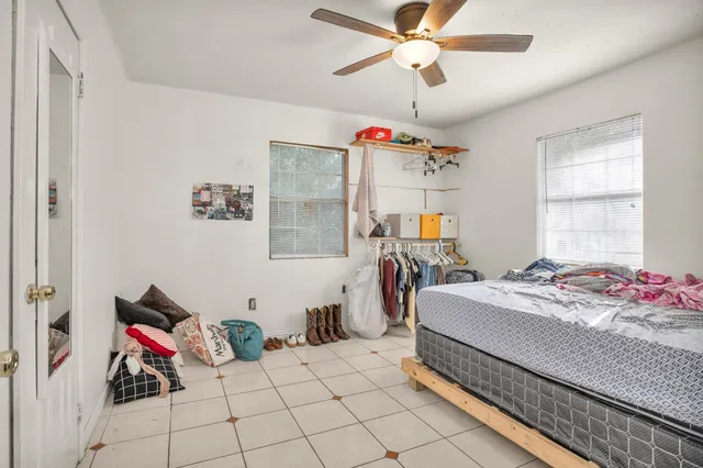 a bedroom with a bed and furniture