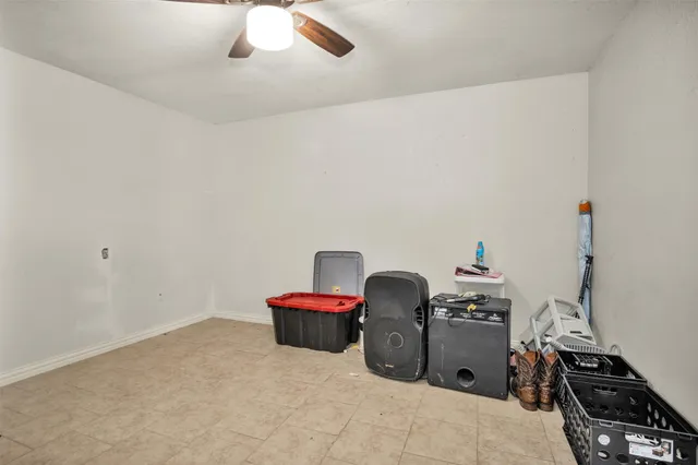 a bed room with a bed and a chandelier