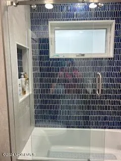 a bathroom with a bathtub