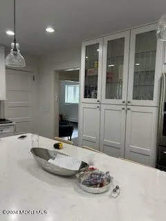 a kitchen with a sink and a stove