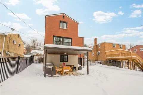 a view of a building with a patio