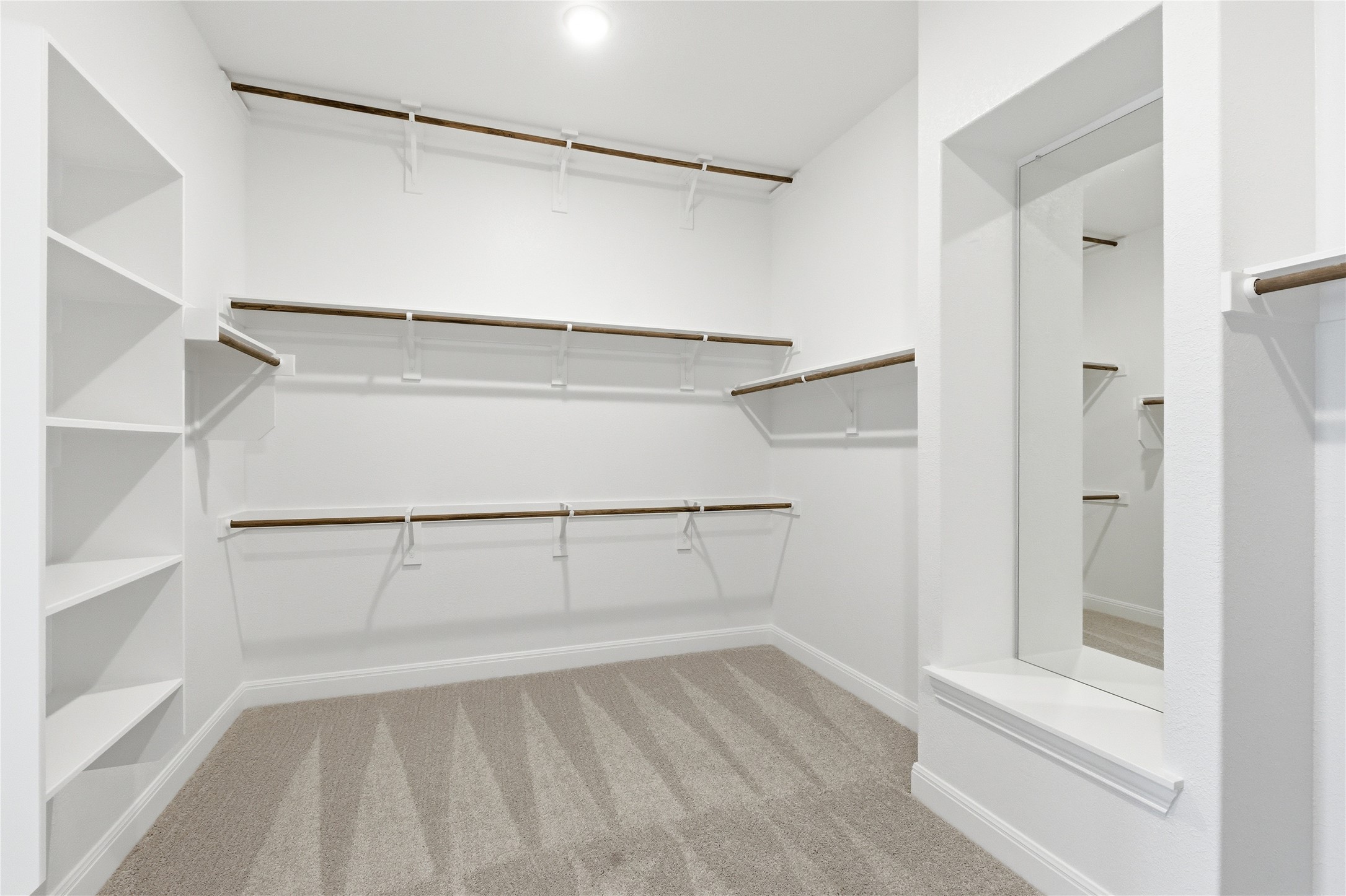 101 Lost Treasure Terrace Georgetown, TX 78628 - Photo 22 of 32 a view of an empty walk in closet