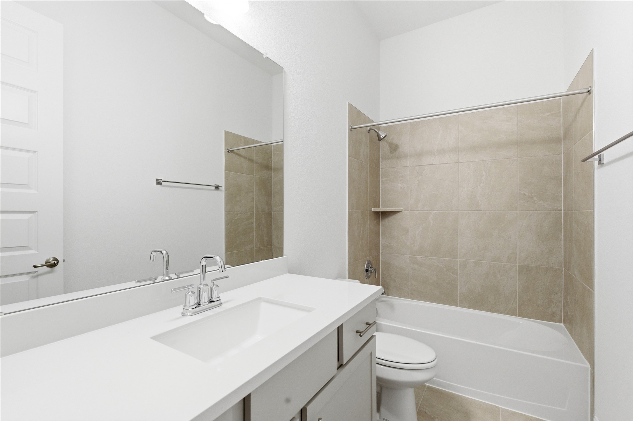 101 Lost Treasure Terrace Georgetown, TX 78628 - Photo 23 of 32 a bathroom with a sink a toilet and shower