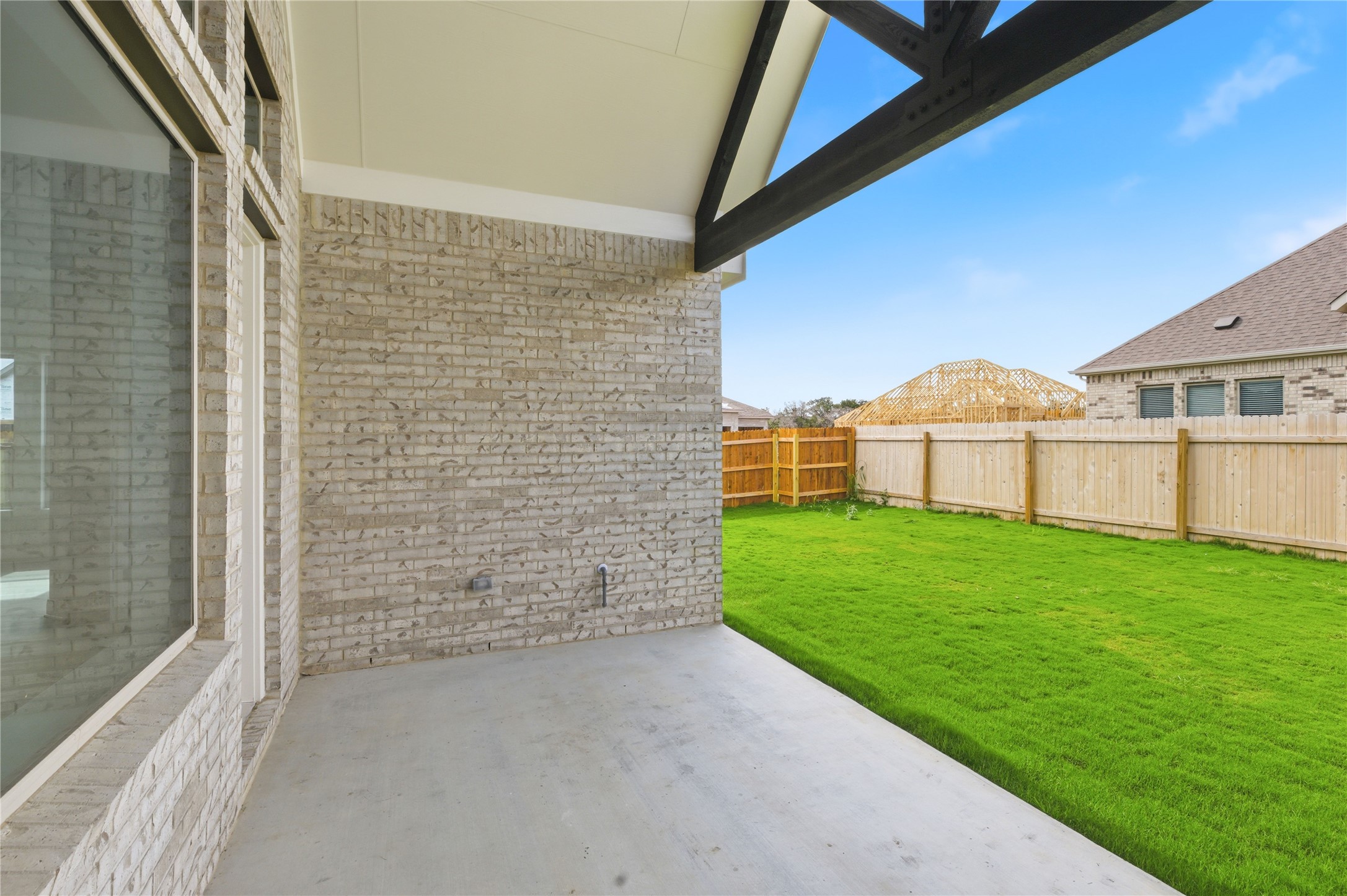 101 Lost Treasure Terrace Georgetown, TX 78628 - Photo 30 of 32 a view of a backyard with plants