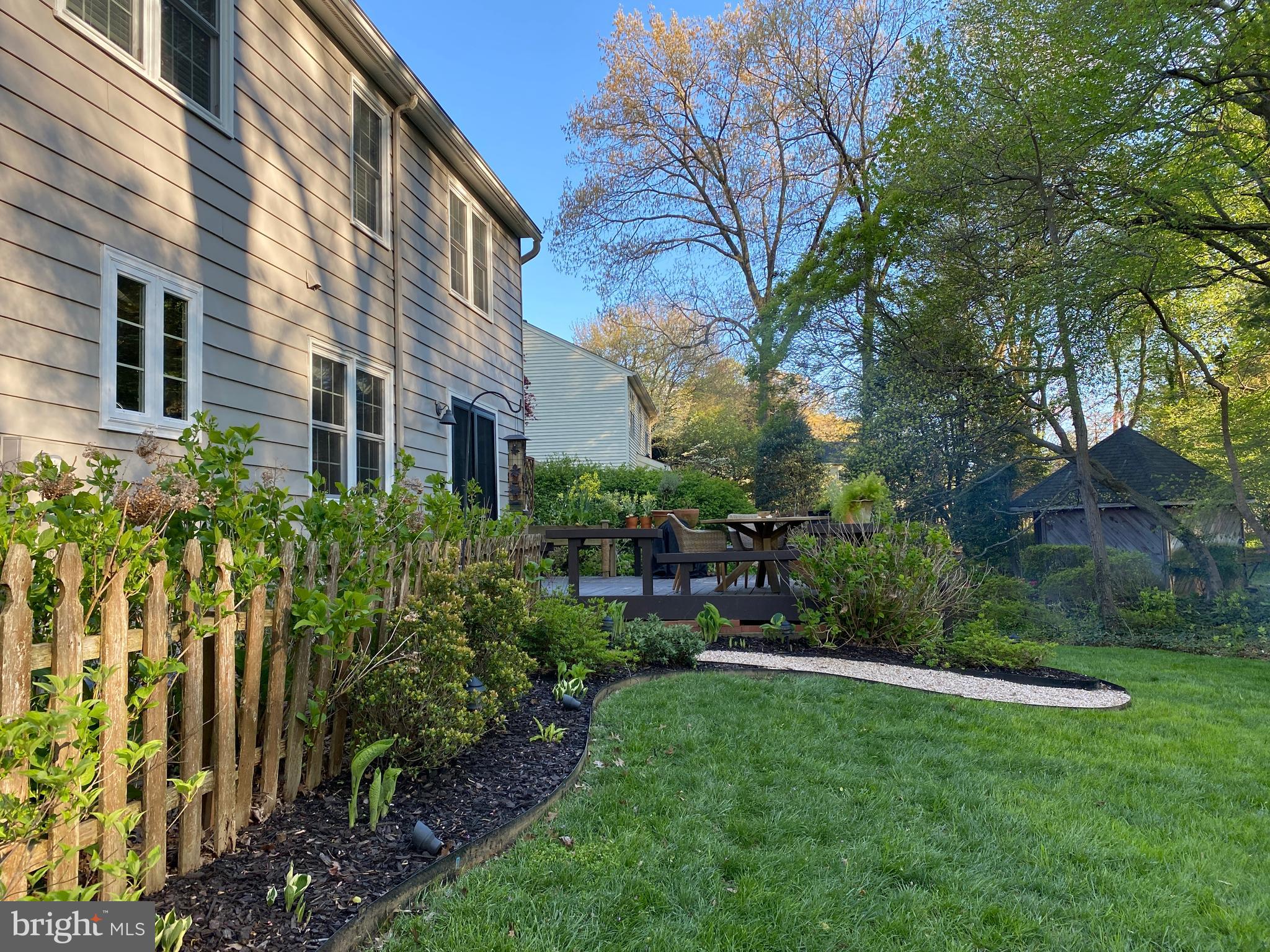 9405 Wallingford Drive Burke, VA 22015 - Photo 32 of 37 PICKET FENCE AND BRICK WORK LEADS TO GREEN HOUSE