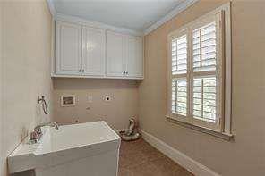 802 Pathview Court Dacula, GA 30019 - Photo 31 of 56 a room with a window and cabinetry