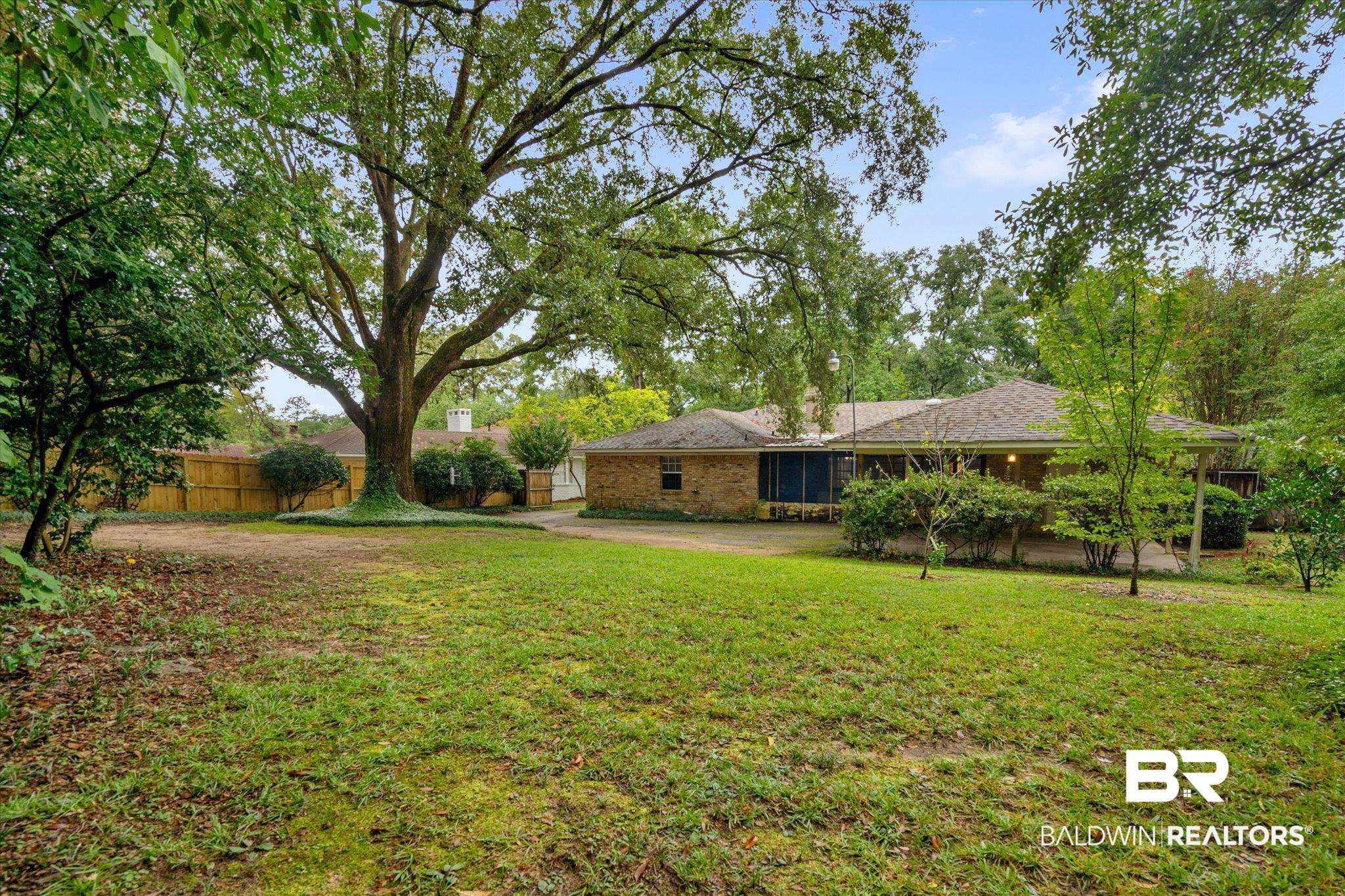 6657 Hounds Run South Mobile, AL 36608 - Photo 18 of 20 View of yard featuring a patio