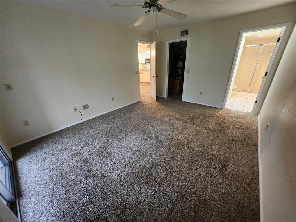 6800 Placida Road, Unit 1004 Englewood, FL 34224 - Photo 11 of 26 a view of an empty room with a window