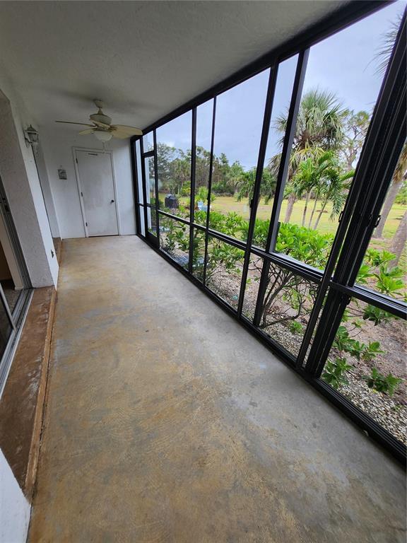 6800 Placida Road, Unit 1004 Englewood, FL 34224 - Photo 18 of 26 a view of an empty room with a large window