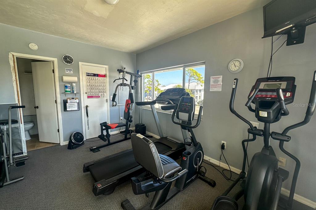 6800 Placida Road, Unit 1004 Englewood, FL 34224 - Photo 24 of 26 a view of a room with gym equipment