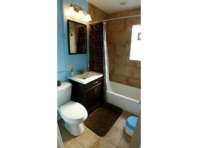 29 Ewing Road McKees Rocks, PA 15136 - Photo 10 of 24 Full Bath. Completely updated with loads of ceramic tile.
