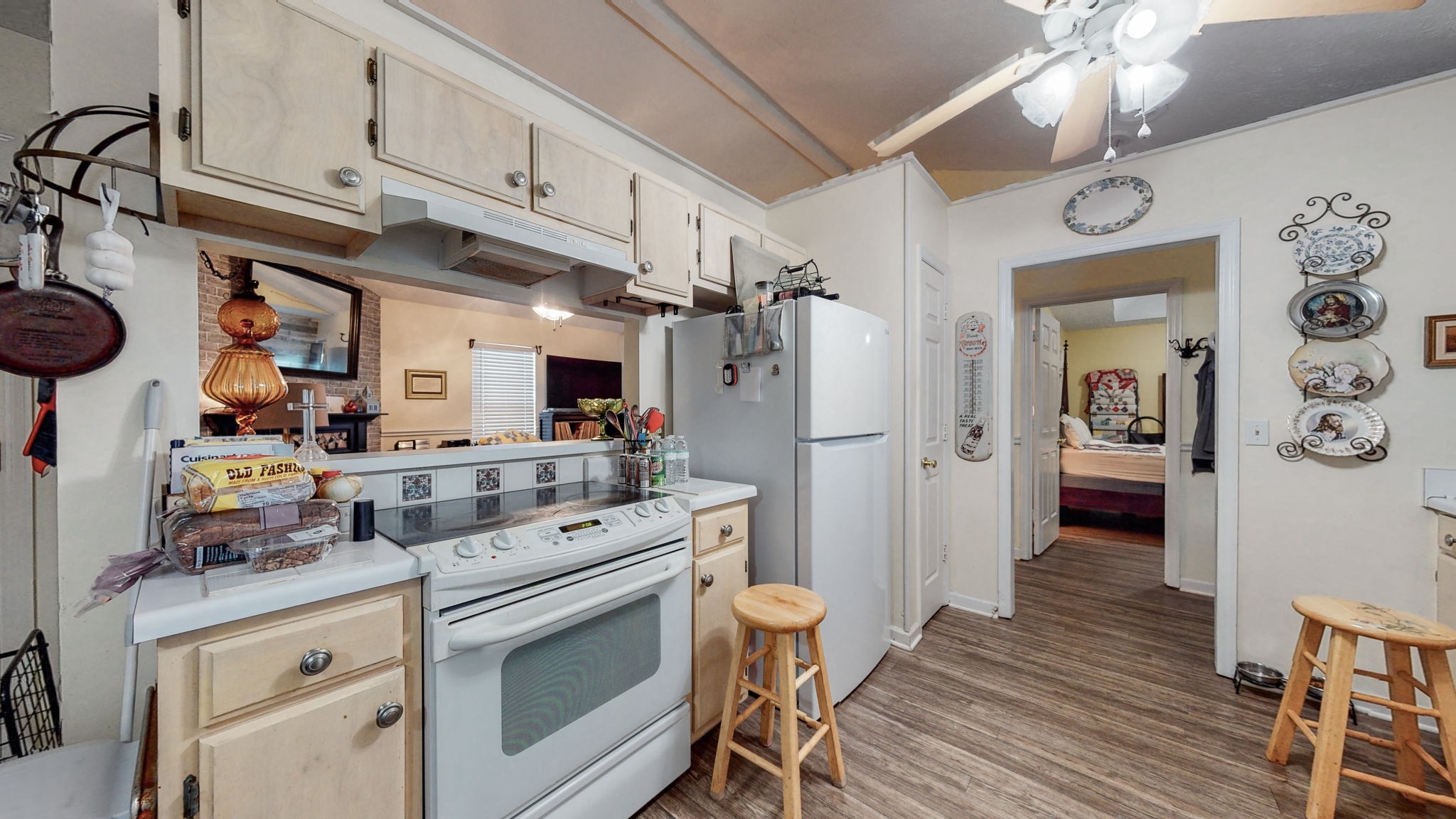 844 Trailside Circle Antioch, TN 37013 - Photo 11 of 27 a kitchen with a sink cabinets and wooden floor