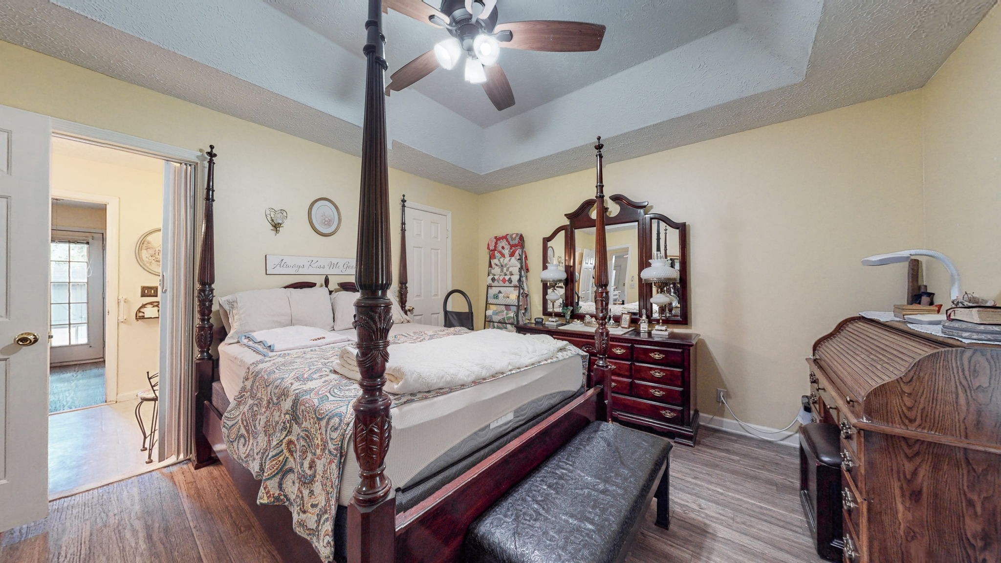 844 Trailside Circle Antioch, TN 37013 - Photo 15 of 27 a bed room with a bed and a chandelier