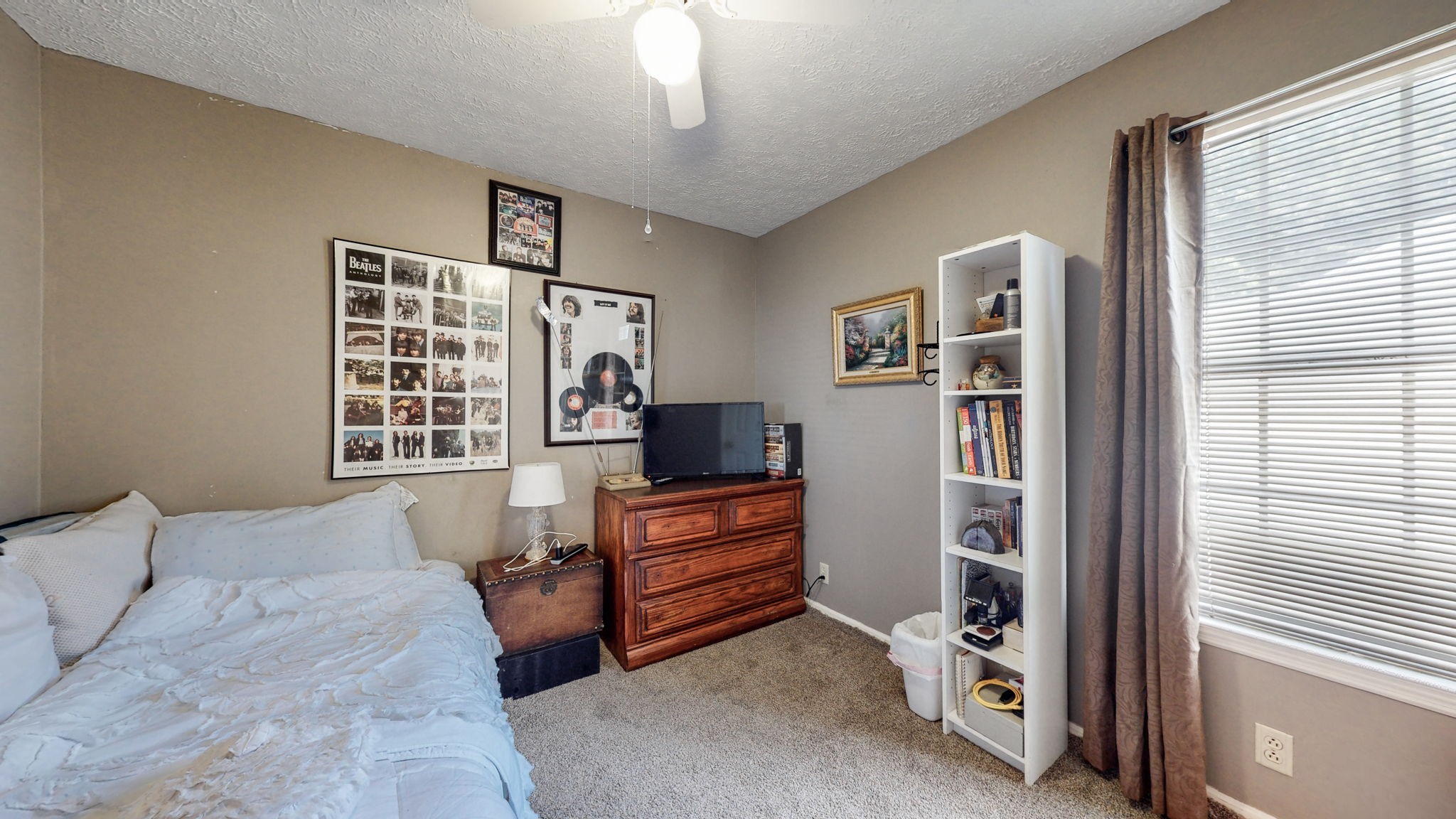 844 Trailside Circle Antioch, TN 37013 - Photo 19 of 27 a bedroom with furniture and a window