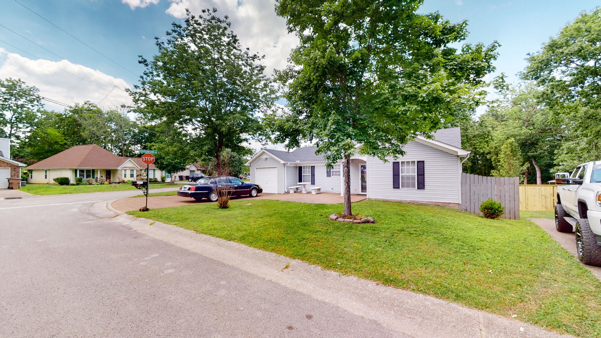 844 Trailside Circle Antioch, TN 37013 - Photo 2 of 27 a view of a house with backyard and sitting area