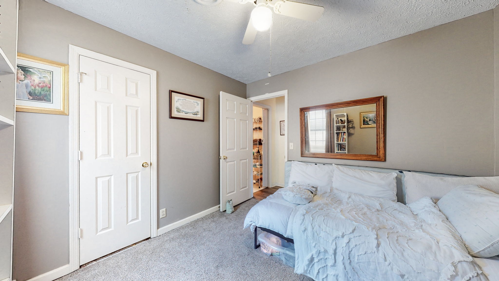 844 Trailside Circle Antioch, TN 37013 - Photo 21 of 27 a bedroom with a bed and a window