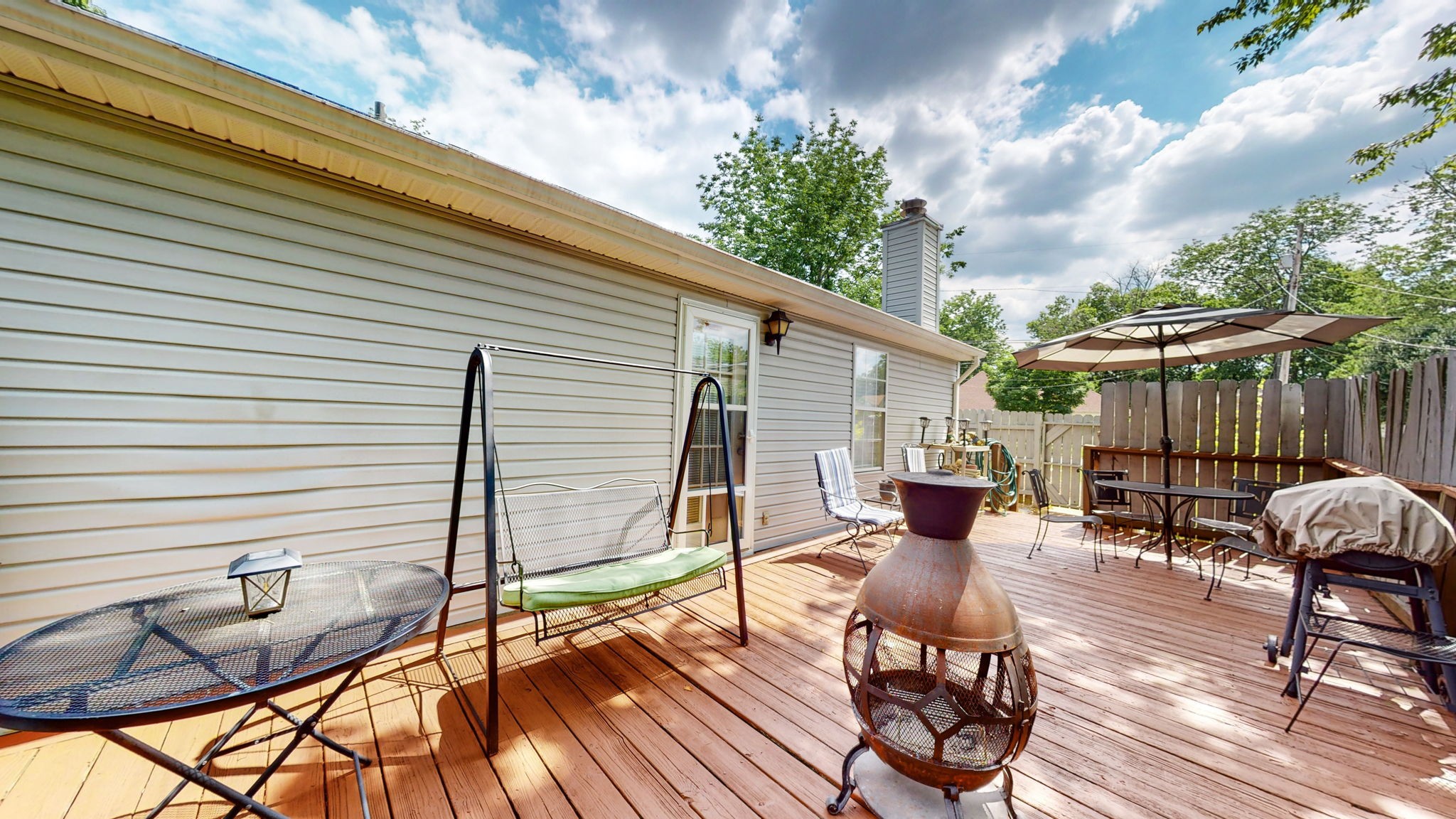 844 Trailside Circle Antioch, TN 37013 - Photo 24 of 27 a patio with table and chairs and potted plants