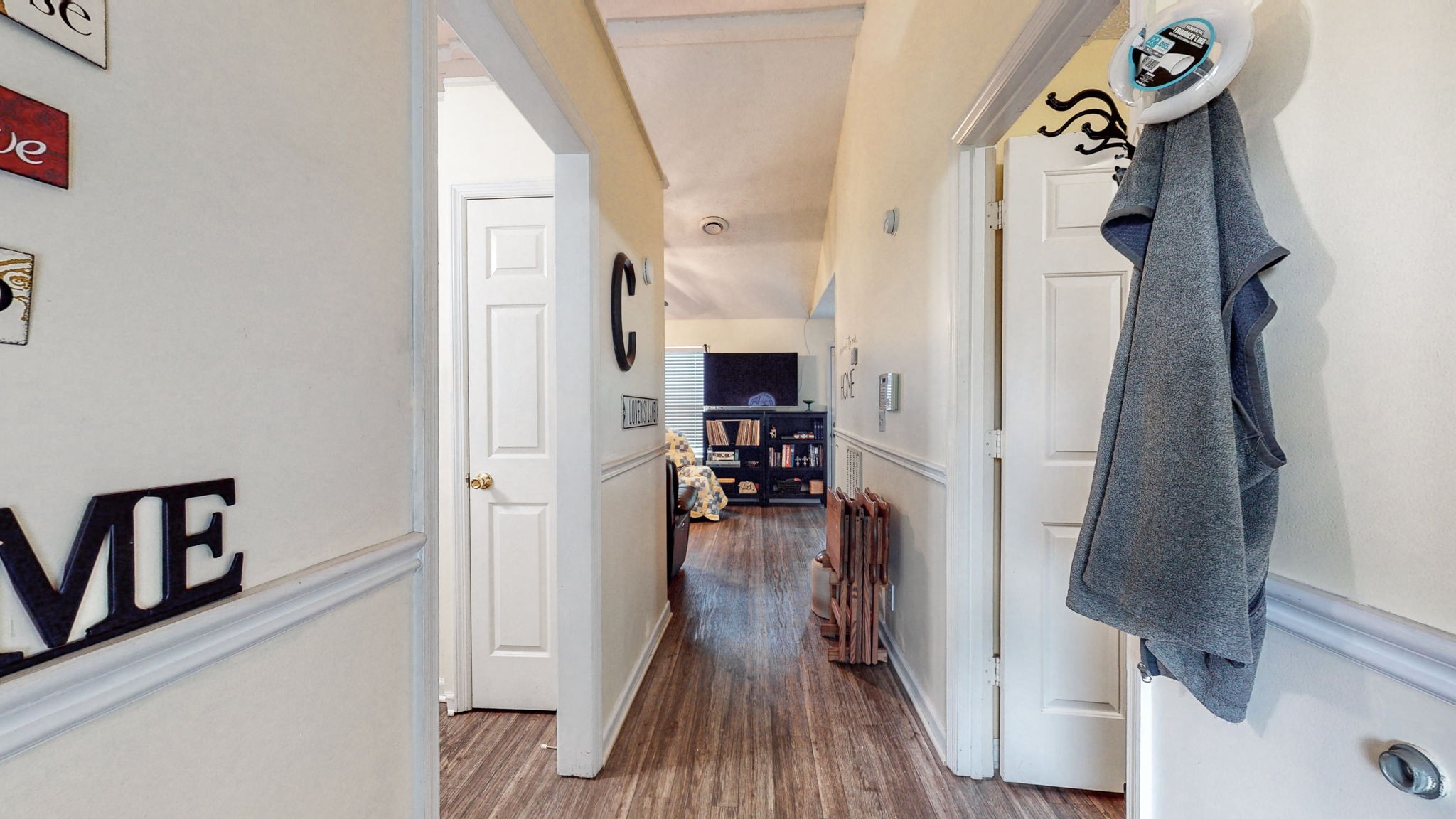844 Trailside Circle Antioch, TN 37013 - Photo 4 of 27 a view of a hallway view with furniture and wooden floor