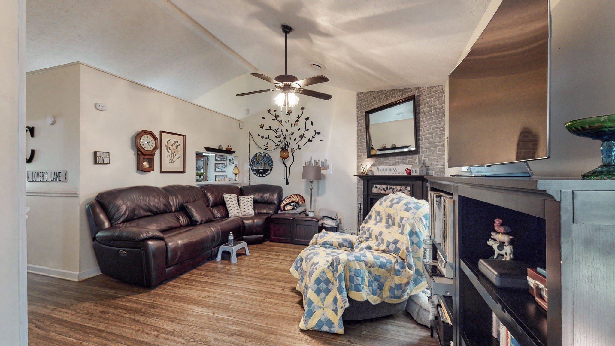 844 Trailside Circle Antioch, TN 37013 - Photo 6 of 27 a living room with furniture and a fireplace