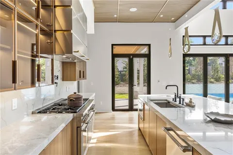 a bedroom with a bed and a fireplace