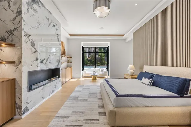 a bathroom with a double vanity sink double mirror and toilet
