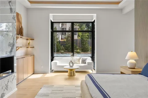 a bathroom with a shower and a mirror