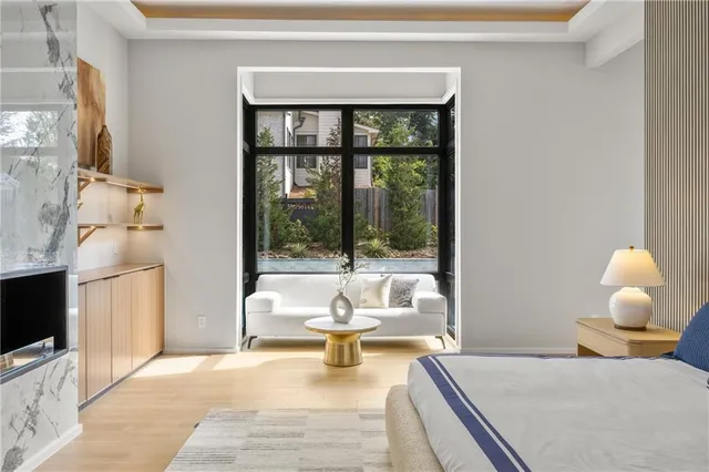 a bathroom with a shower and a mirror