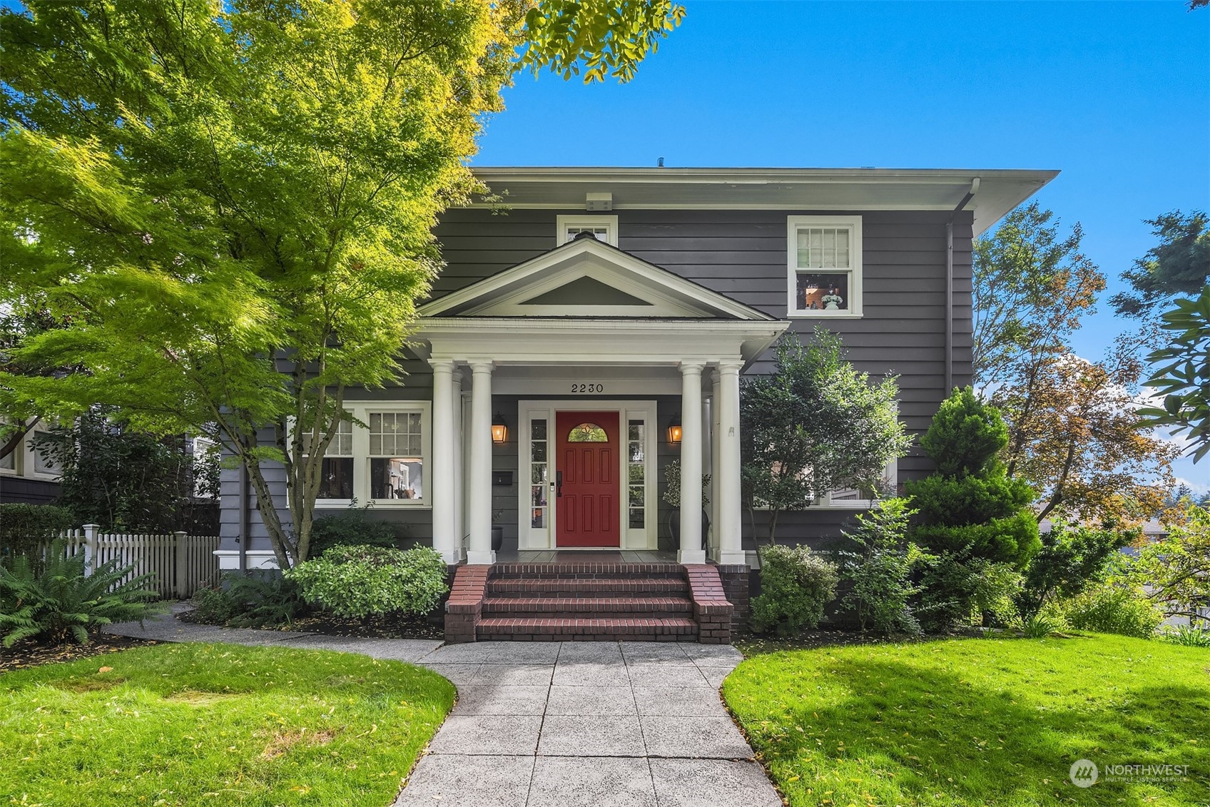2230 33rd Avenue South Seattle, WA 98144 - Photo 1 of 39 a front view of a house with garden