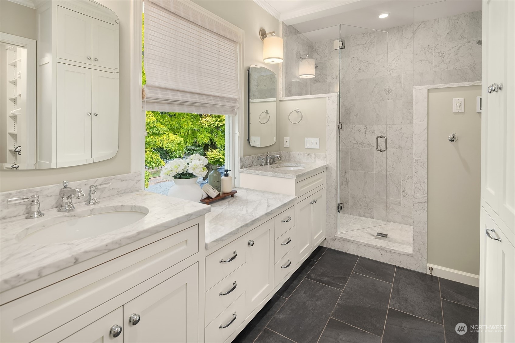 2230 33rd Avenue South Seattle, WA 98144 - Photo 19 of 39 a bathroom with a double vanity sink mirror and shower