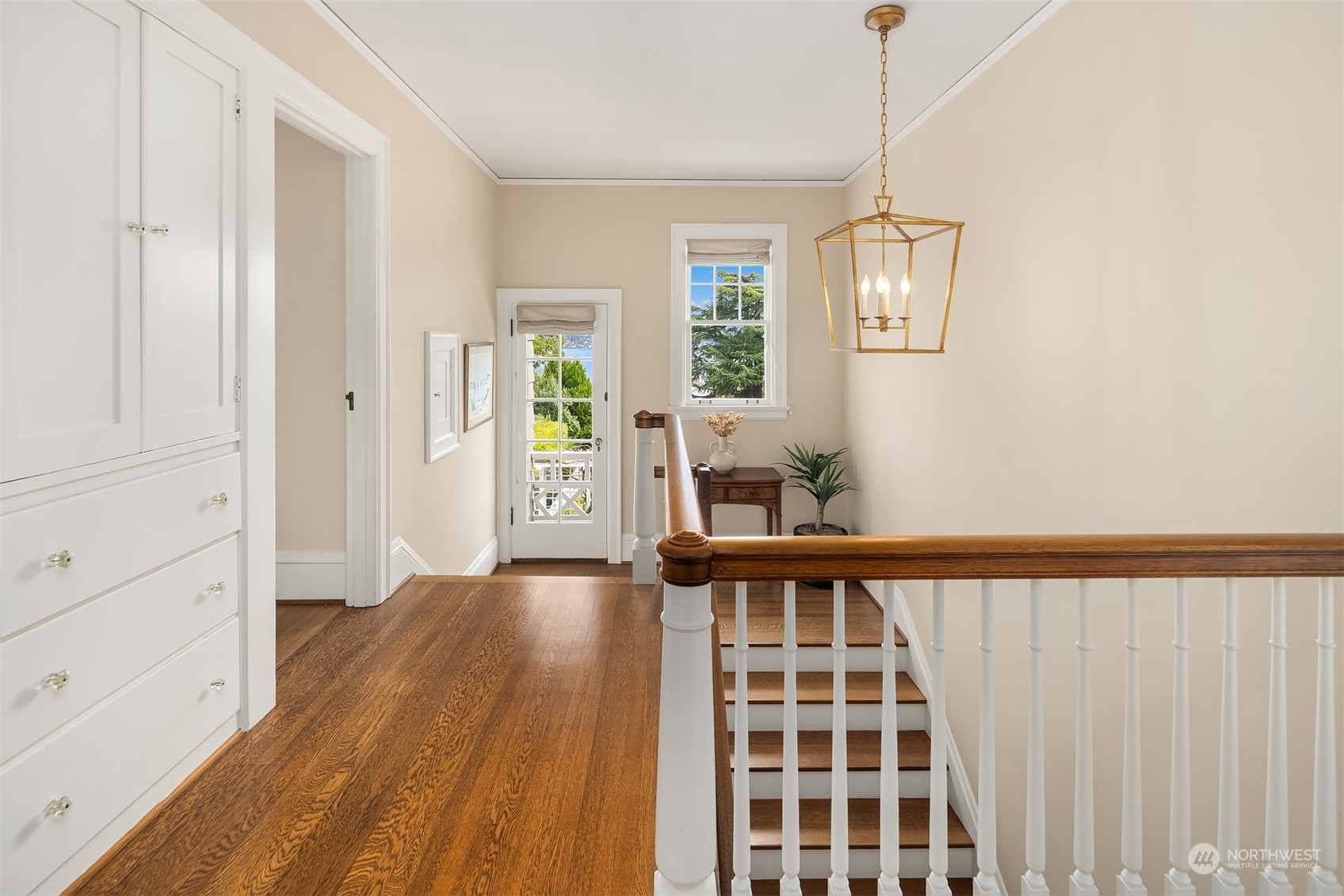 2230 33rd Avenue South Seattle, WA 98144 - Photo 20 of 39 a view of a bedroom with wooden floor and windows