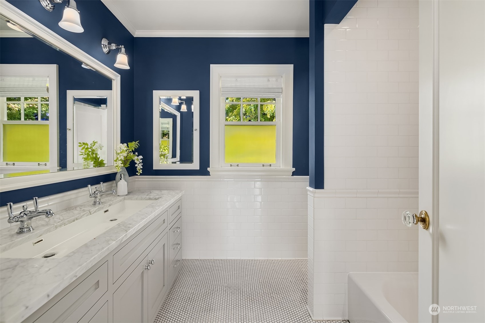 2230 33rd Avenue South Seattle, WA 98144 - Photo 22 of 39 a bathroom with a bathtub and a sink