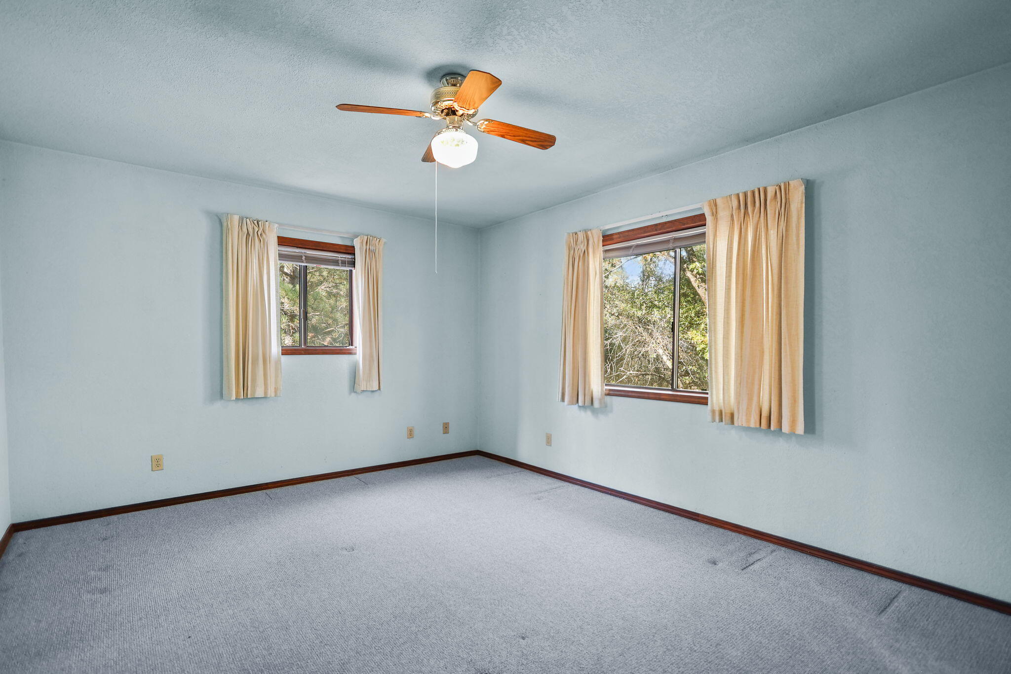28424 Alpine Way Shingletown, CA 96088 - Photo 13 of 42 an empty room with a window