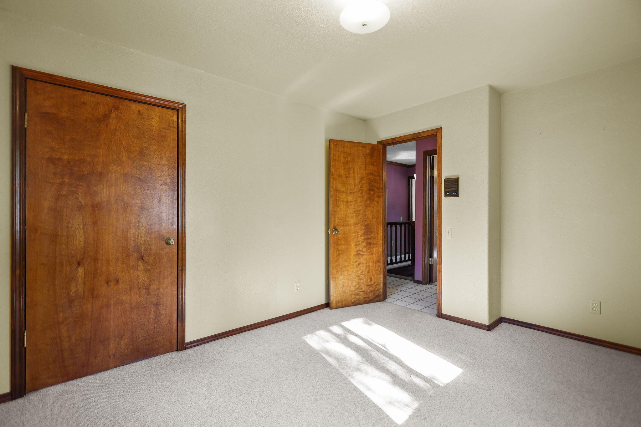28424 Alpine Way Shingletown, CA 96088 - Photo 17 of 42 a view of an empty room with closet and wooden door