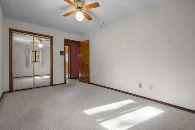 a view of outdoor space with trees all around