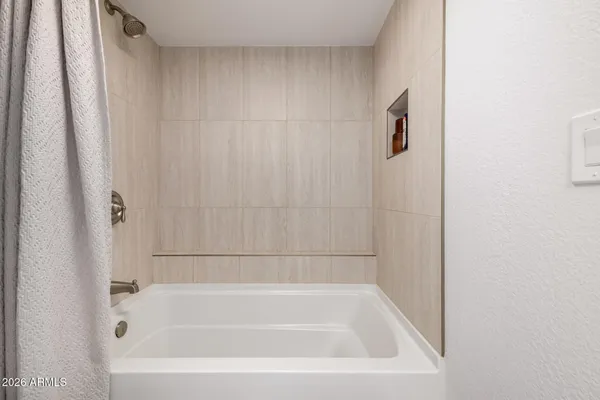 a bathroom with a bathtub