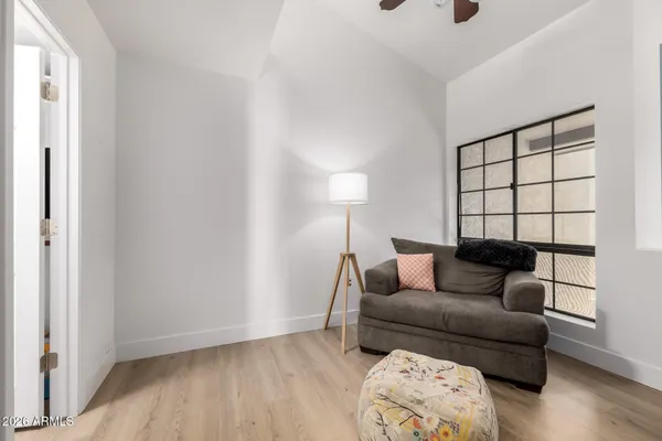 a living room with furniture and a window