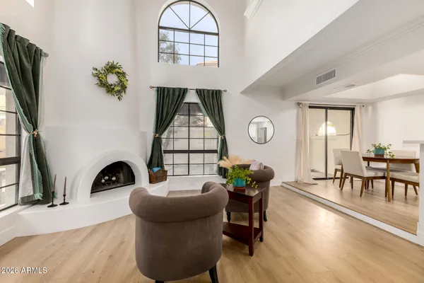 a living room with furniture and a window