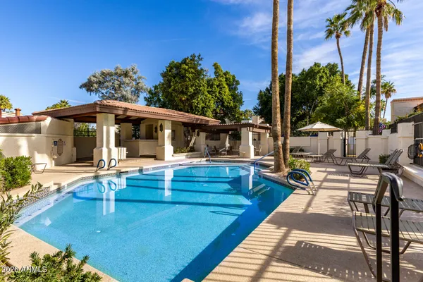 a view of a house with swimming pool
