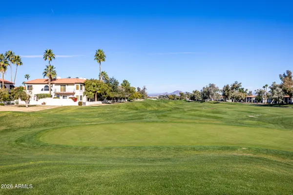a view of a fountain with an empty space