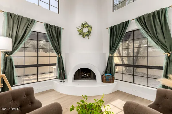 a living room with furniture and a window