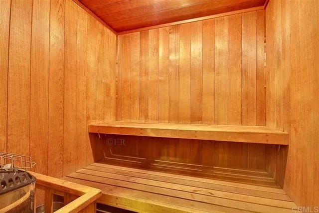 a bathroom with a sink and curtain