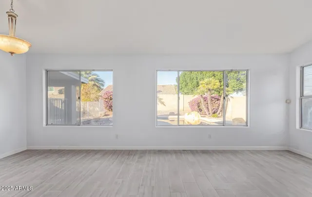 an empty room with windows