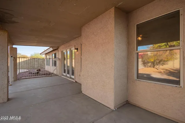 a view of backyard with green space