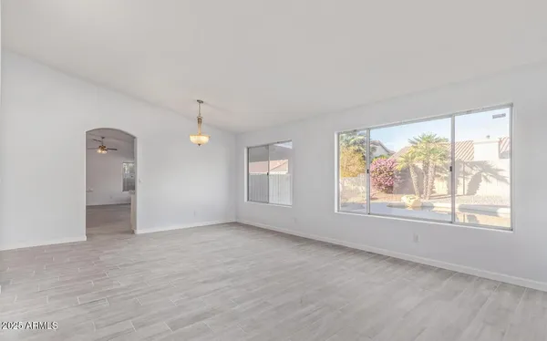 an empty room with windows