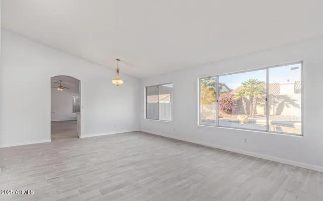 an empty room with windows