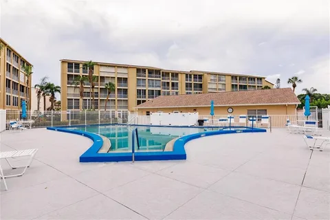 a front view of a house with swimming pool