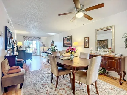 a view of a dining room with furniture