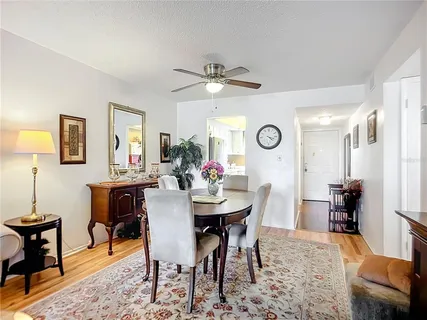 a view of a dining room with furniture