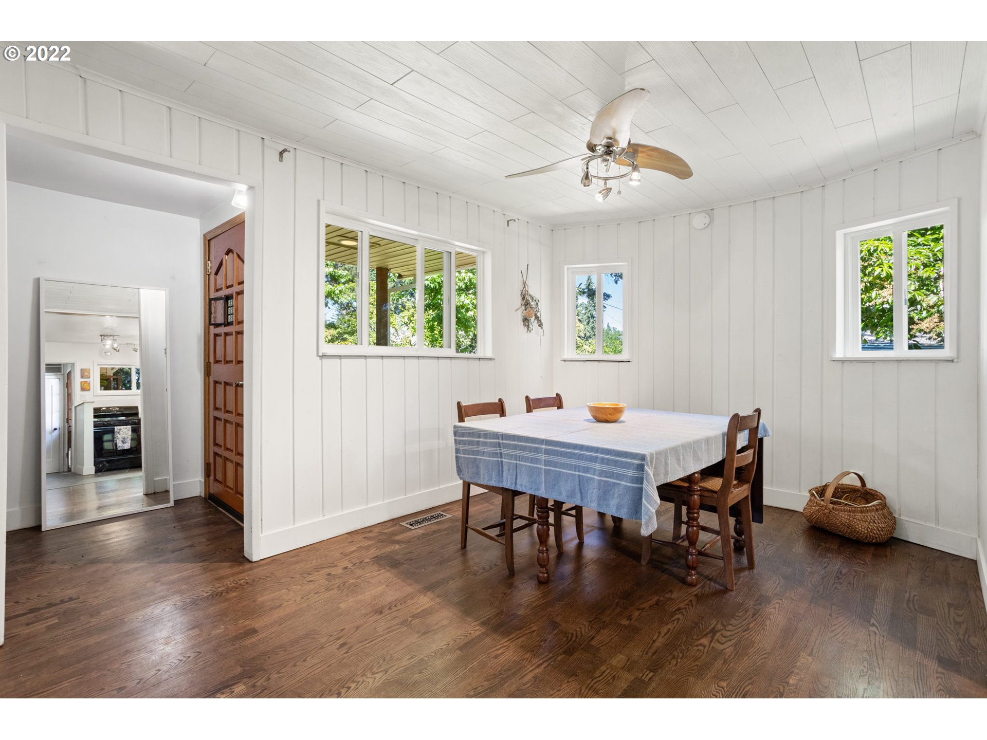 2020 Southeast Waldron Road Milwaukie, OR 97222 - Photo 6 of 32 a dining room with furniture and wooden floor