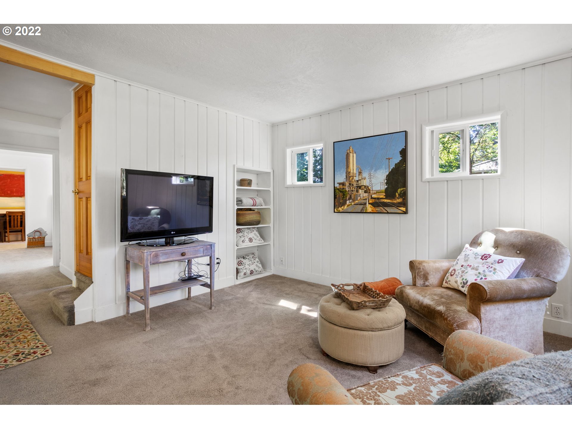 2020 Southeast Waldron Road Milwaukie, OR 97222 - Photo 8 of 32 a living room with furniture and a flat screen tv
